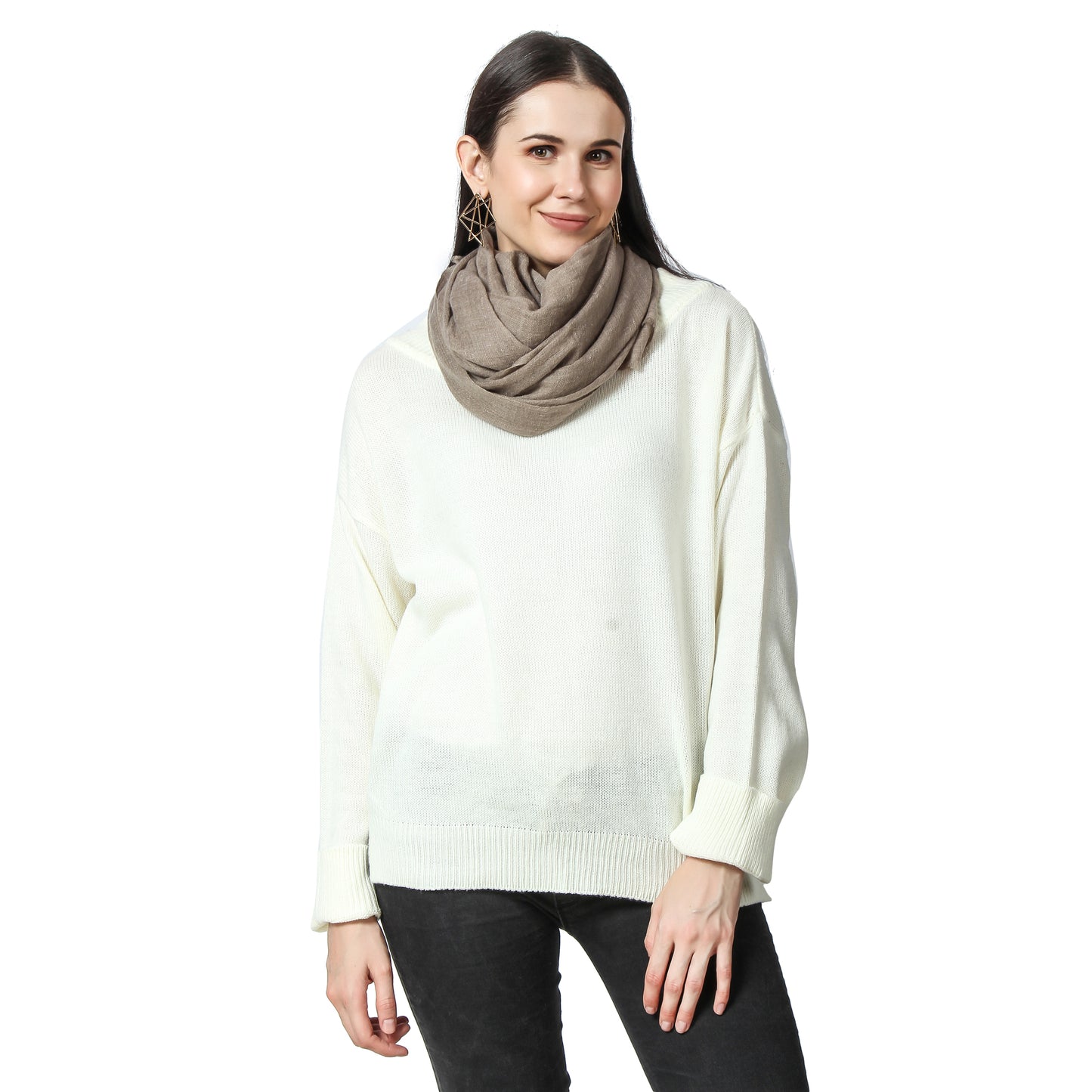 a woman wearing a Cashmere Scarf around her neck on a white Sweater and a black jeans