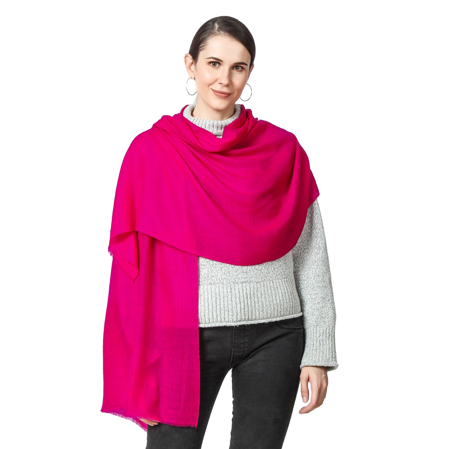 A woman wearing a fuchsia Cashmere Scarf with Grey Color Sweater and Black Pants